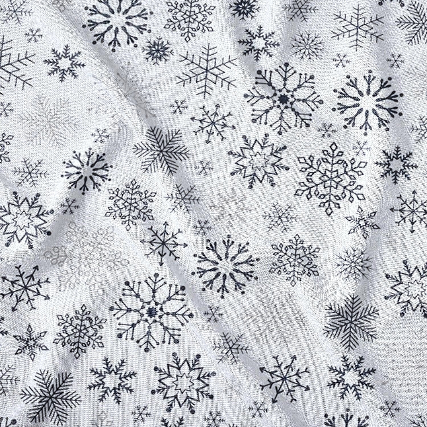 Bomullstyg - Antracitfärgade snöflingor på vit bakgrund